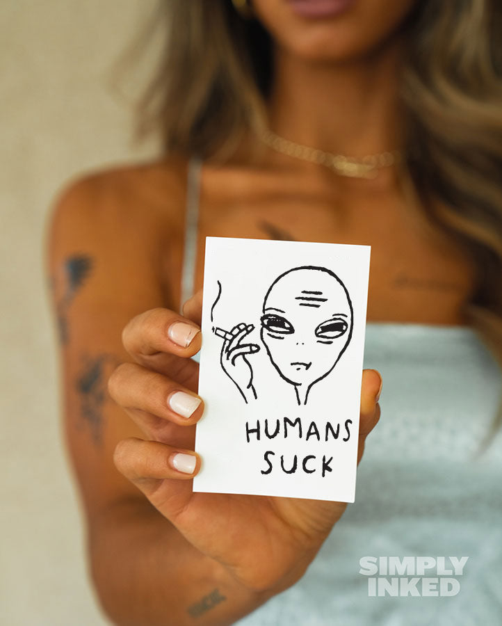 Humans Suck Tattoo